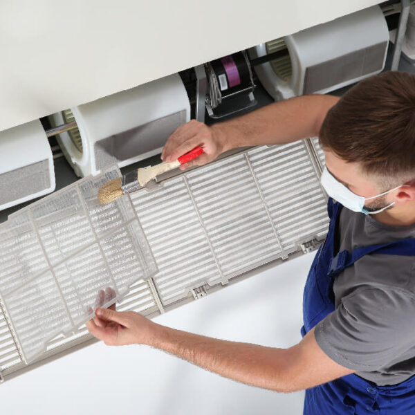 Repair-Technicial-Replacing-Air-Filter—When-to-Change-Commercial-Air-and-Water-Filters-in-Your-Foodservice-Facility (1)